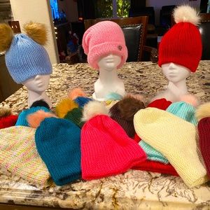 Handmade Knitted Beanies With Faux Fur Pom Poms. Embellishments can be added